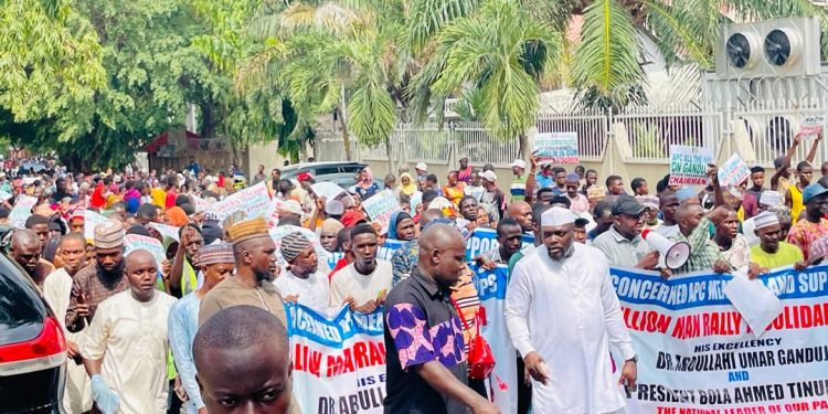 Concerned APC Group Rally in Support of National Chairman Ganduje Draws Thousands of Supporters in Abuja.