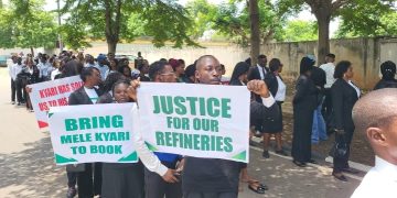 Protesters storm US embassy, seeks visa ban on Mele Kyari over alleged corruption